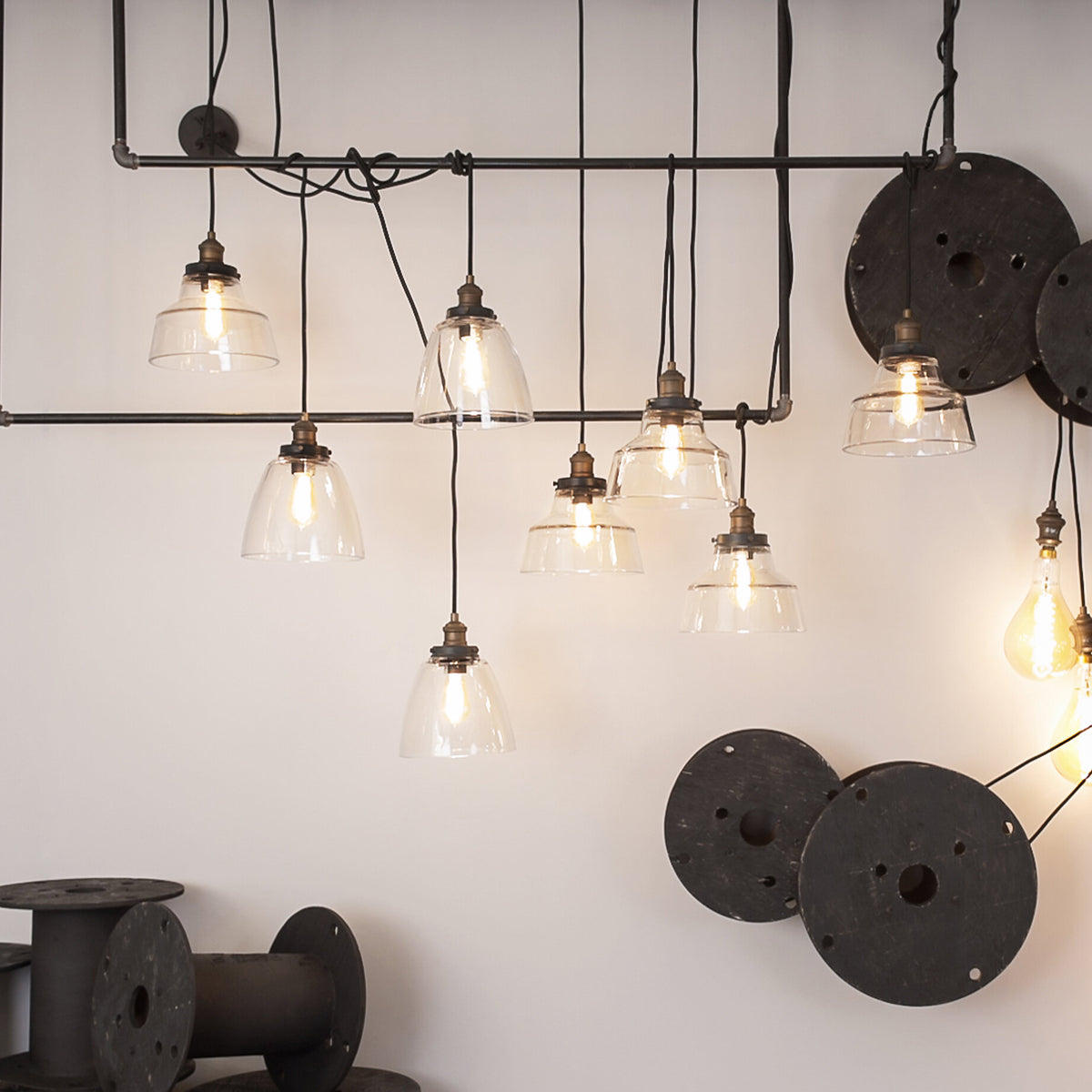 Baskin Dome Single Kitchen Pendant by Visual Comfort in a styled interior