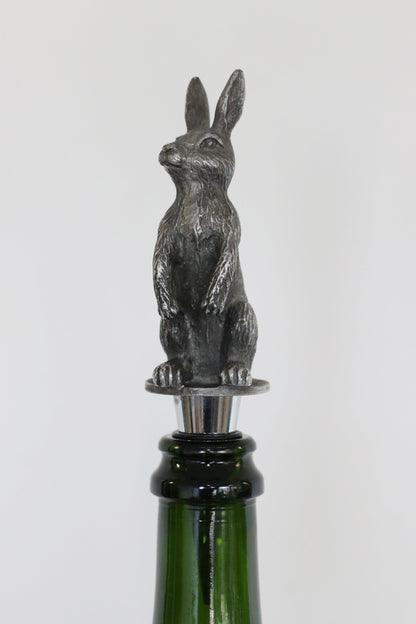 Wine bottle stopper with rabbit design on a white background