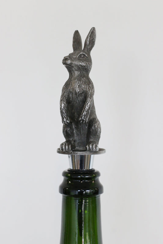 Wine bottle stopper with rabbit design on a white background