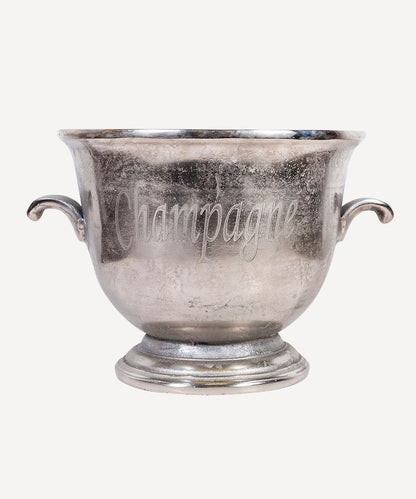 Silver champagne cooler with 'Champagne' engraving on a white background