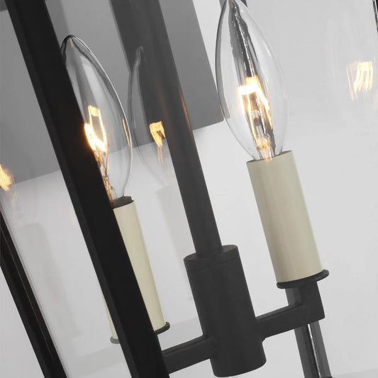 Warren Medium Exterior Wall Lantern by Visual Comfort on a home exterior