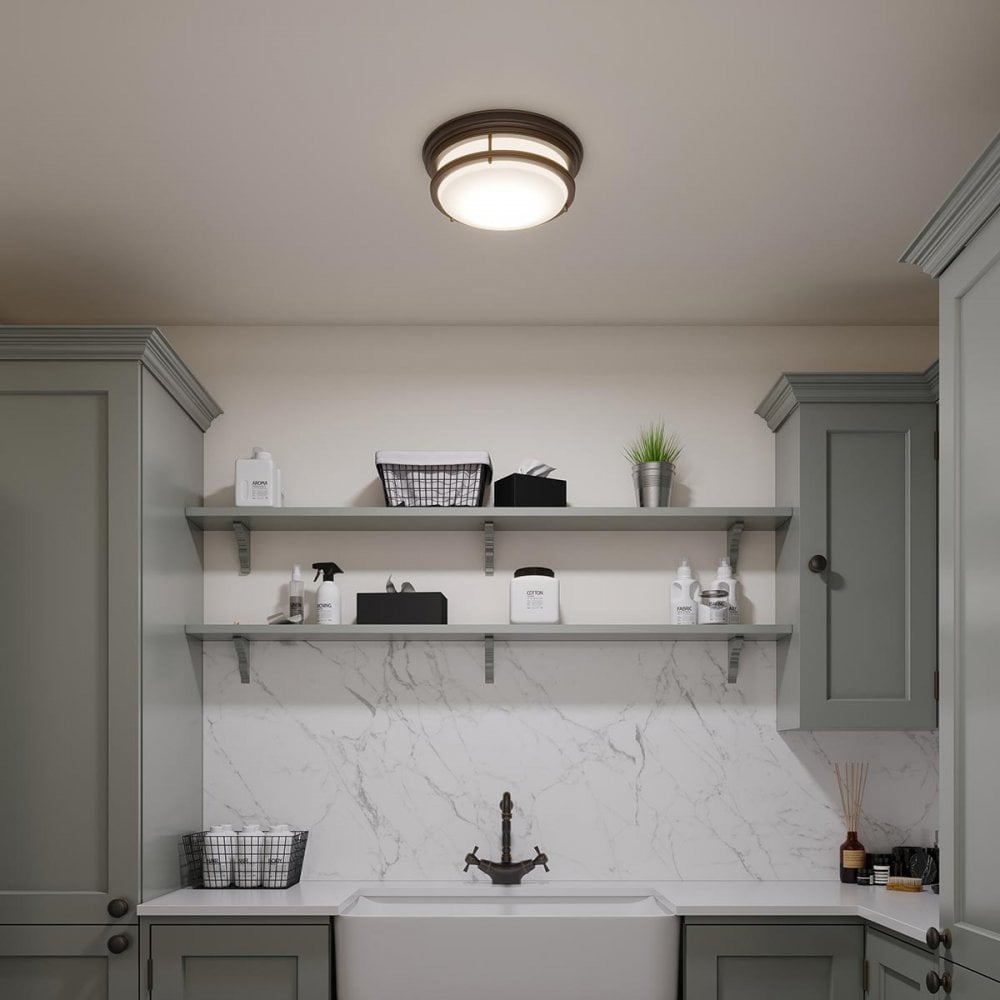 Hadley Large 3 Light Flush Ceiling Mount by Hinkley in Oil Rubbed Bronze, shown in a styled interior